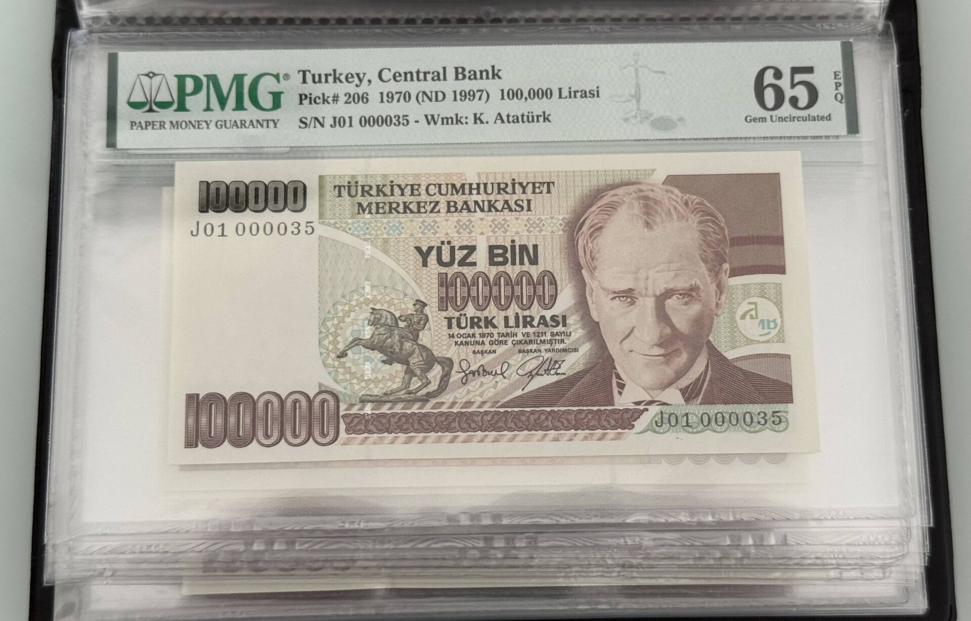 7. Ems 100.000 TL, J01 000035, PMG 65 Epq, ÇİL