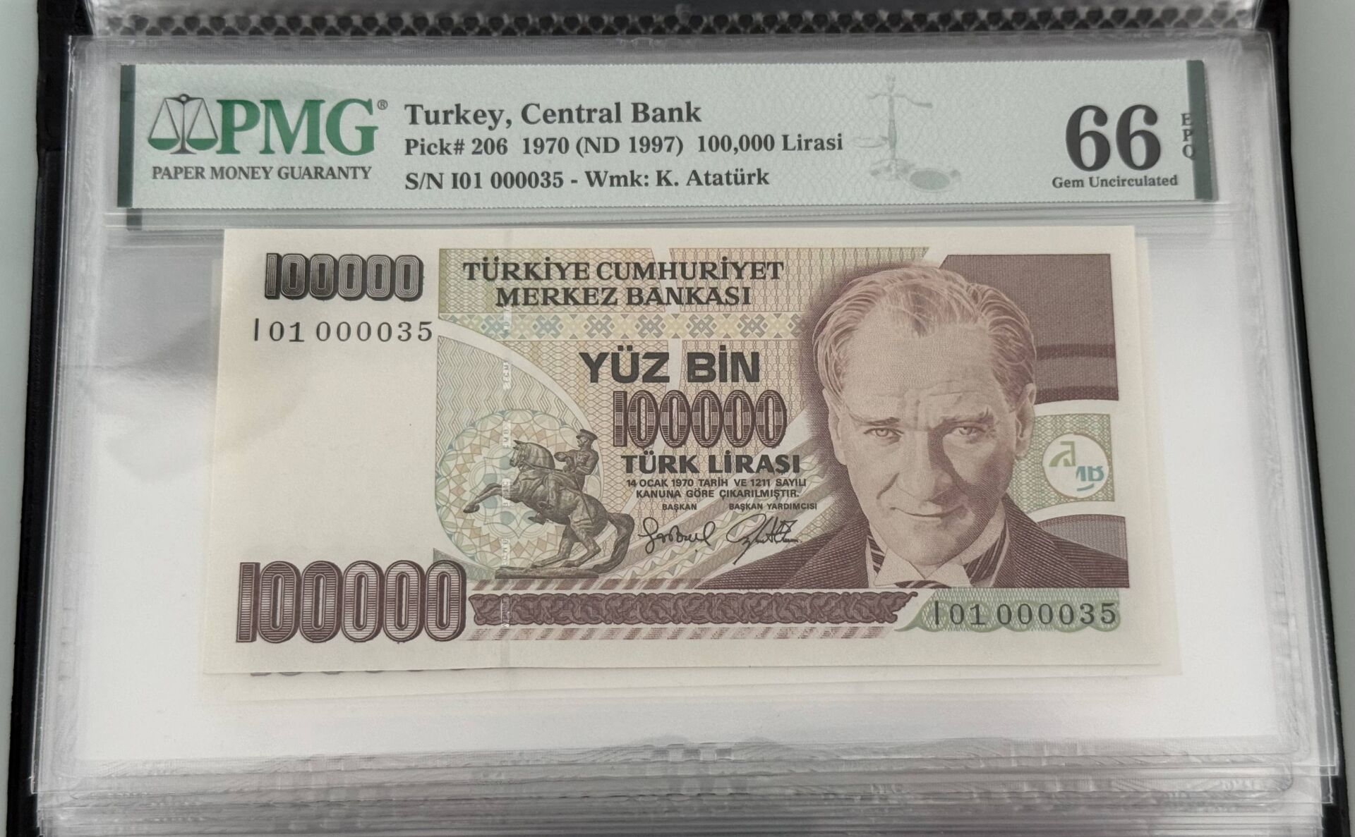7. Ems 100.000 TL, I01 000035, PMG 66 Epq, ÇİL