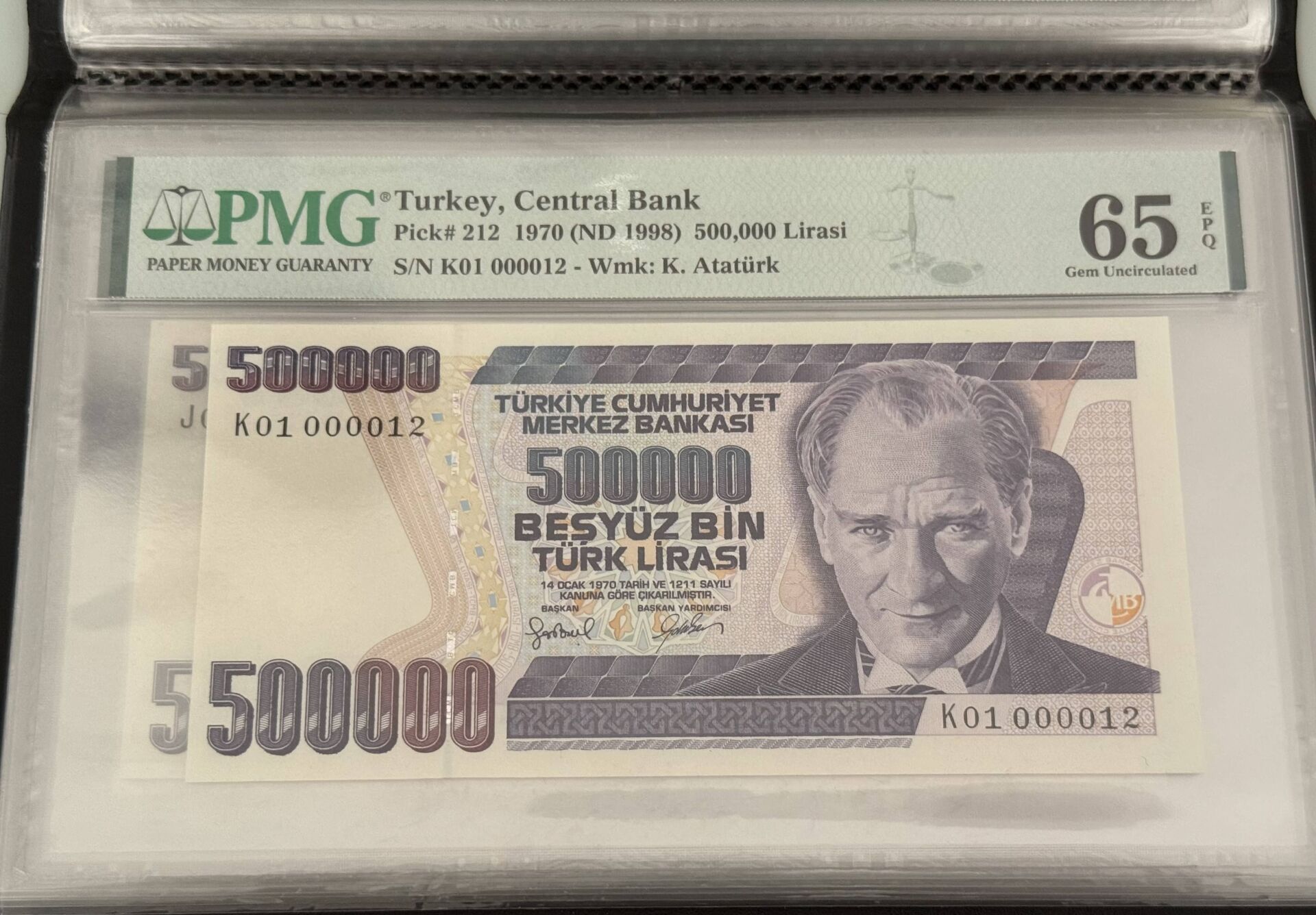 7. Ems 500.000 TL, K01 000012, PMG 65 Epq, ÇİL