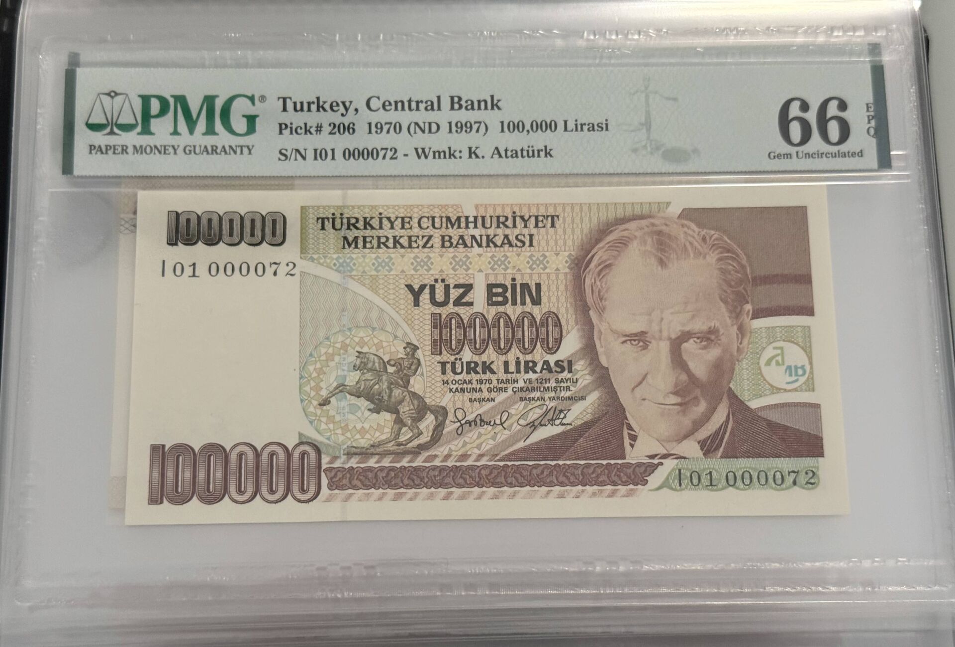 7. Ems 100.000 TL, I01 000072, PMG 66 Epq, ÇİL