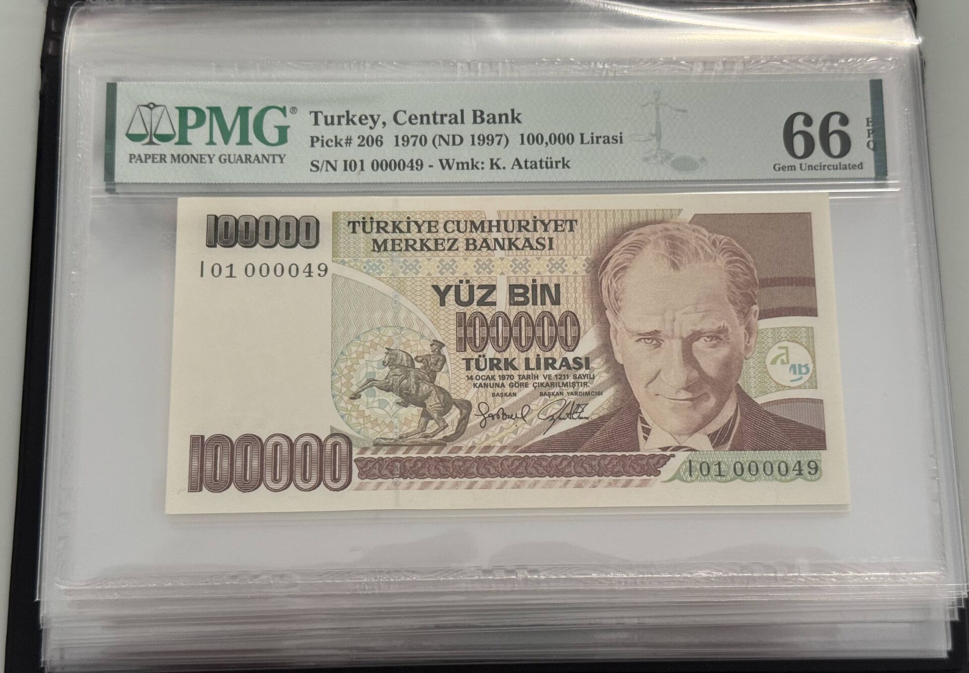 7. Ems 100.000 TL, I01 000049, PMG 66 Epq, ÇİL